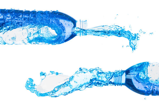 Drinking Water in Plastic Bottle fall fly in mid air, fresh water plastic bottle floating explosion. Fresh water plastic bottles pour throw in air. White background isolated freeze motion high speed