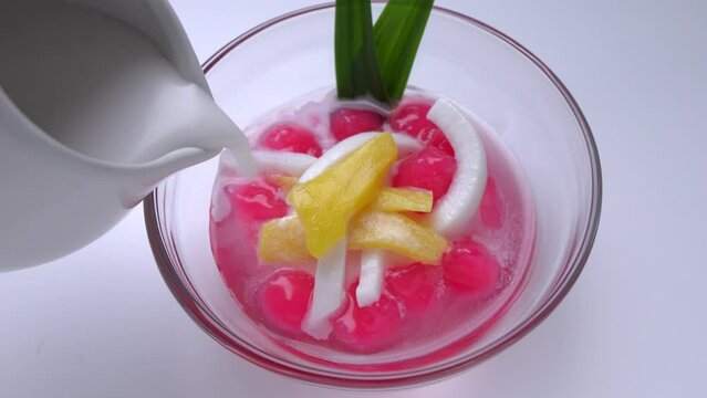 Tub Tim Krob Thai traditional dessert Crispy Ruby in coconut milk. Sweet taste eat with ice for freshness.