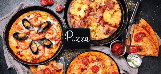 Freshly served various pizzas.