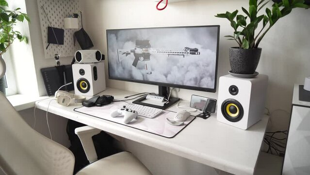 General view home workplace of gamer with computer and gamepad. 