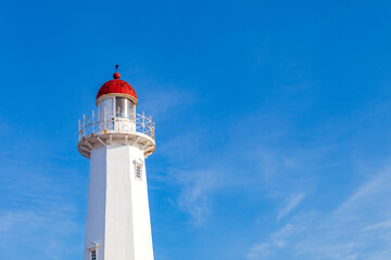 Fototapeta na wymiar A sea view with a lighthouse and blue sky in Haeundae Cheongsapo Port, Busan, Korea