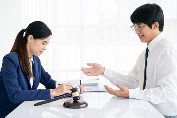 Client in law office Judge gavel with lawyers, Businessman in suit or lawyer working with legal law...