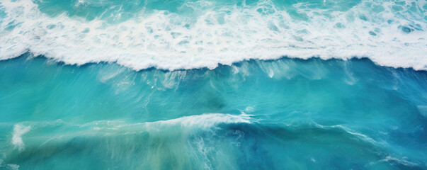 Sea waves or ocean surface from aerial view. Blue water with foam, copy space for text.