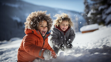 Fototapeta na wymiar Two black african mixed race girl and boy toddlers wearing winter coats, laughing and playing in the snow, snowing and snowflakes, snowballs and snow fight, winter christmas season