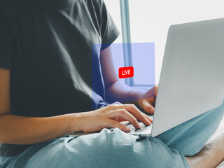 Live Viewing live broadcasts over the Internet. on social media Modern marketing information and digital advertising via laptop