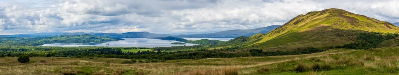 Naklejka na ściany i meble Panoramic view of Conic Hill and Loch Lomond in the beautiful Scottish Highlands