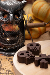 Dark chocolate and Peanut Butter treats in skull and crossbones shapes for your favorite trick-or-treater.