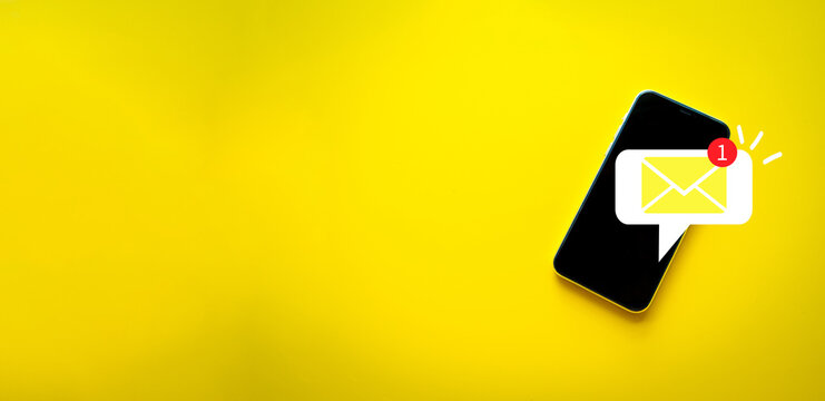 Email notification,Reminder,incoming message,Social Network concept.,New email on the smartphone screen over yellow background with copyspace concept for business,technology,marketing,communication.