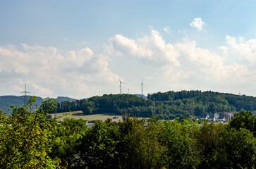 Wind turbines on a mountain in Germany general view landscape - Powered by Adobe
