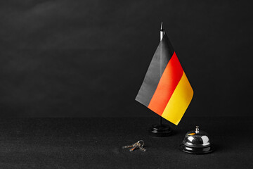 Germany flag on the reception desk in the hotel lobby