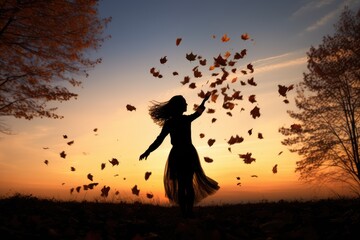 Silhouette of a person releasing leaves into the wind at dusk - Letting Go - Autumn Season - AI Generated