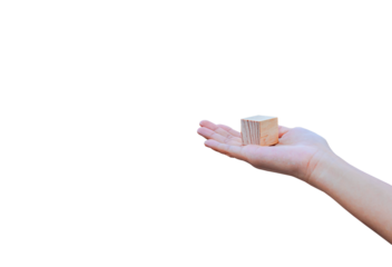 Hand holding a wooden block isolated on white background. PNG