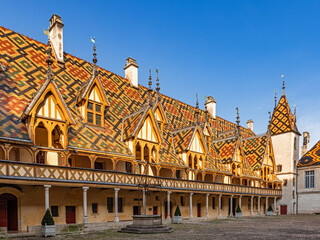 Beaune, France; April 18, 2023: The Hospices de Beaune or Hôtel-Dieu de Beaune is a former...