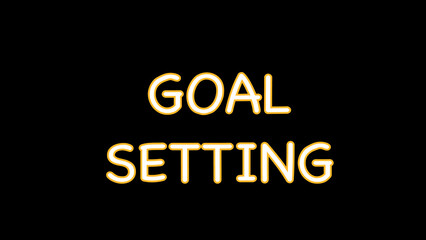 Goal setting concept written on black background 