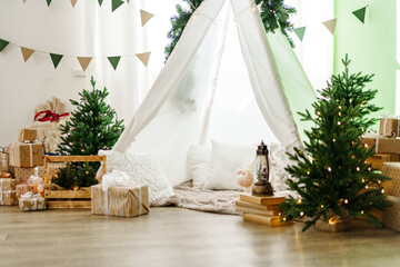 Christmas interior of a children's room with teepee