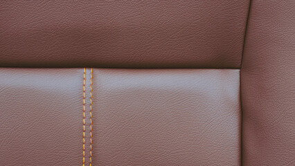 Yellow stitching lines decorative on brown artificial leather upholstery of sofa chair. close up...