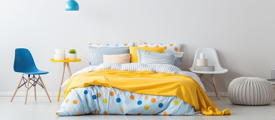 Teenager s bedroom with vibrant bed linens and table lamp