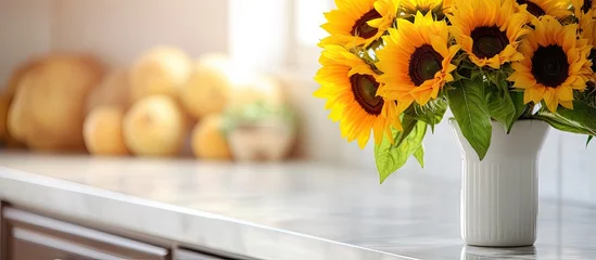 Rolgordijnen Beautiful sunflowers arranged on kitchen counter © HN Works