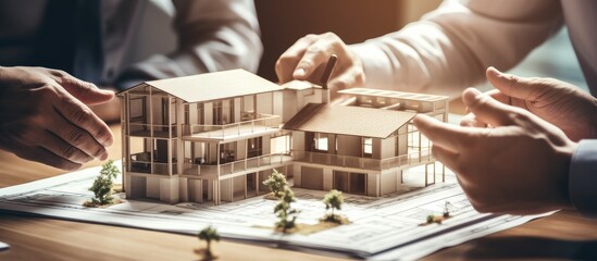 Engineers and architects collaborating on vintage house plans