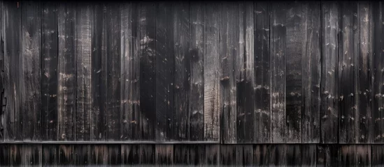Photo sur Plexiglas Texture du bois de chauffage Traditional Japanese method of wood preservation known as yakisugi creates a burnt wooden plank building exterior