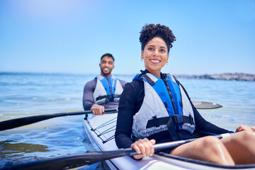 Water, man and woman in kayak for race at lake, beach or river for exercise in sports at sea. Ocean...