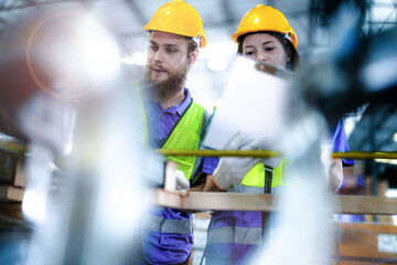 technician engineers team checking the machine and maintenance service. workers looking at the...