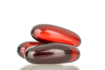 Several medical pills, macro, isolated on white background.