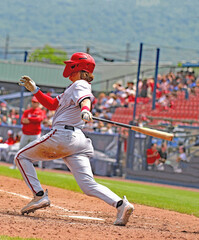 baseball player swinging