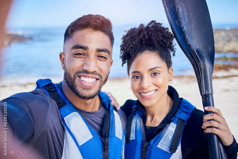 Wall mural Selfie, kayak and couple with a smile, beach and summer vacation with memory, post and social media. Portrait, people and man with woman, water sports and picture with ocean, training and holiday