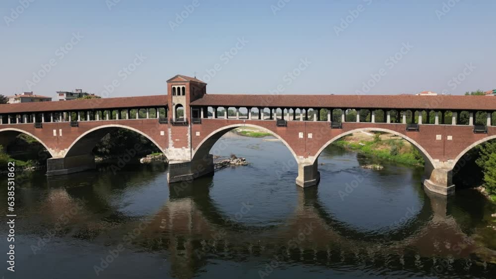 Wall mural europe, italy , pavia - drone aerial view of pavia city in lombardy with ponte coperto ( covered bri