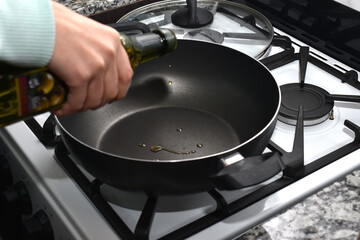 woman cooking popcorn at home to watch a movie