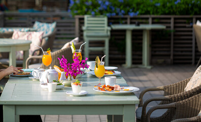 breakfast on table,Table full of various fresh food in luxury modern restaurant in hotel. Delicious dishes
