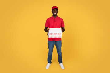 Glad millennial african american guy courier hold many pizza boxes