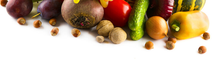 Set of vegetables and fruits isolated on a white . Wide photo. Free space for text.
