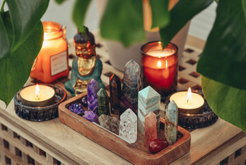 Various minerals and healing crystals on a wooden tray - 638555200