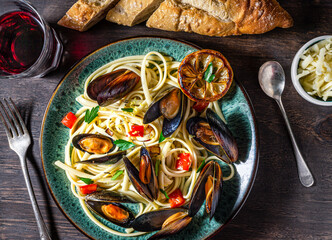 Mussels linquine with garlic and red peppers.