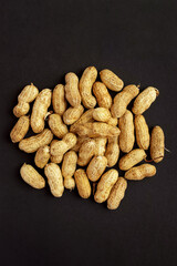 Roasted peanuts, peanuts in shell Isolated on black background