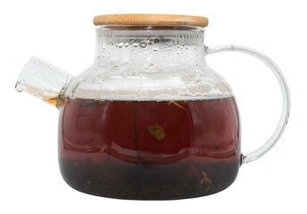Glass teapot with large tea leaves on a white background. Tea. tonic drink