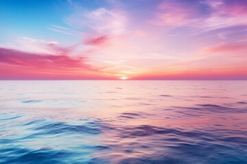 Sky with a gentle pastel sunset over ocean