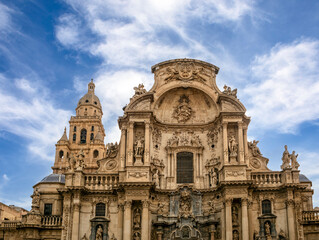 Fototapeta na wymiar Baroque facade of the monumental Cathedral of Santa Maria, Murcia, Spain.