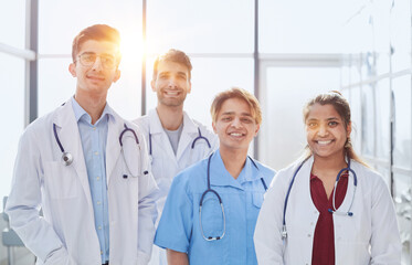 Fototapeta premium Professional Multinational Doctors Camera Posing. Teamwork Connection.