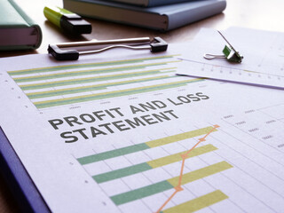 Profit and loss statement is shown using the text and photo of charts