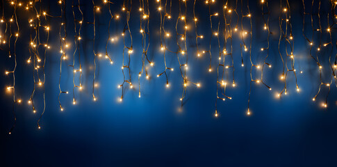 Obraz na płótnie Canvas Hanging light bulbs on dark background. Cozy decoration indoor cafe or Christmas party vibe