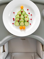 Healthy and fun food for children, serving food for children, Christmas and New Year, cucumber tree