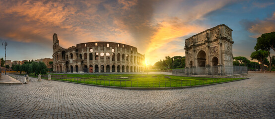 Colosseum panorama at sunrise in Rome, Italy  - obrazy, fototapety, plakaty