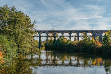 Railway Bridge with river in Bietigheim-Bissingen, Germany. Autumn. Railway viaduct over the Enz...