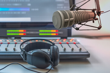 Professional microphone and headphones in radio studio