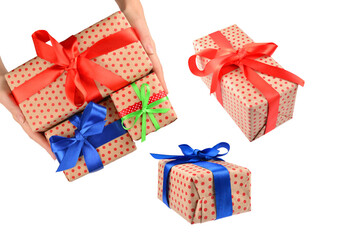 Present in woman hand on white background.