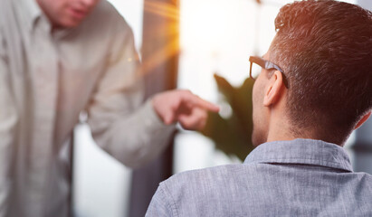 Business negotiations. Two colleagues talking in the office.