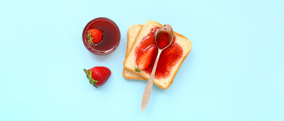 Tasty toasts with sweet strawberry jam on light blue background, top view